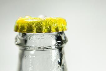 Discover the Reason Behind Coke Bottles' Yellow Caps 